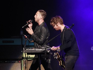Ryan Tedder, left lead singer of OneRepublic and Drew Brown, right, at the glockenspiel, perform at the Bell Centre on Monday April 20, 2015.