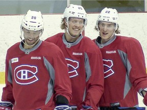 From the left: Manny Malhotra, Jacob De La Rose and Dale Weise of the Canadiens share a laugh during practice in Mont-Tremblant on April 21, 2015 while preparing for Game 4 against the Ottawa Senators in Eastern Conference quarter-final series.