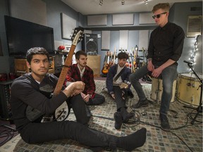 Montreal four-piece rock n roll band Heat, left - right: Susil Sharma, Guitar, Matthew Fiorentino, Guitar, Raphael Bussieres Bassist, Alex Crow Drummer, at their recording space in Montreal, on Tuesday April 21, 2015.