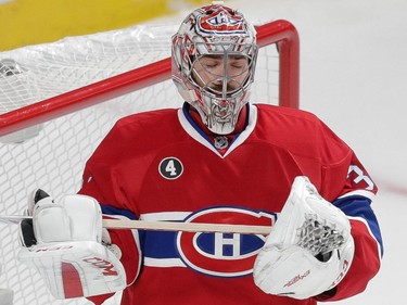 Montreal Canadiens goalie Carey Price reacts after a penalty was called against him for delay of game during the second period of game five of their NHL Eastern Conference quarter-final match against the Ottawa Senators at the Bell Centre in Montreal on Friday, April 24, 2015. (Dario Ayala / Montreal Gazette)