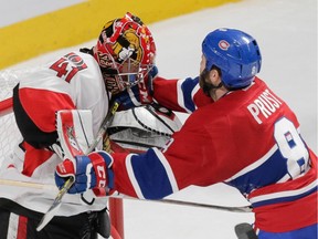 The Canadiens' Brandon Prust pushes Ottawa Senators goalie Craig Anderson during the third period of Game 5 of their Eastern Conference quarter-final series at the Bell Centre in Montreal on April 24, 2015.