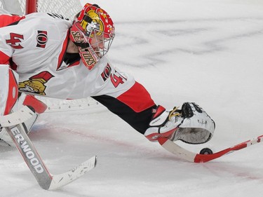 MONTREAL, QUE.: APRIL 24, 2015 -- Ottawa Senators goalie Craig Anderson makes a save during the second period of game five of their NHL Eastern Conference quarter-final match against the Montreal Canadiens at the Bell Centre in Montreal on Friday, April 24, 2015. (Dario Ayala / Montreal Gazette)