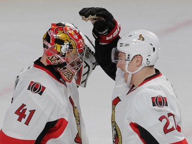 Ottawa Senators goalie Craig Anderson is congratulated by teammate Curtis Lazar after victory over the Canadiens in Game 5 of the the Eastern Conference quarter-final series at the Bell Centre on April 24, 2015.