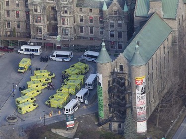 MAmbulances outside the Royal Victoria Hospital wait to take patients to the Glen Site in Montreal Sunday, April 26, 2015.