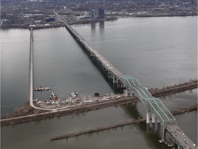 An aerial view of the Champlain Bridge, with the parallel Ice Bridge, left, across the St. Lawrence River.