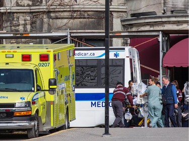MONTREAL, QUE.: APRIL 26, 2015 -- Patients are brought to ambulances as they get ready to be moved from the Royal Victoria hospital to MUHC Glen campus on the hospital's moving day in Montreal on Sunday, April 26, 2015. (Dario Ayala / Montreal Gazette)