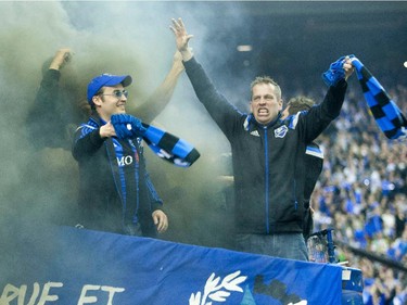Fans  of the Montreal Impact cheer in the first half of the final game of CONCACAF Champions League final between Montreal Impact and Club America from Mexico City in Montreal at the Olympic Stadium Wednesday, April 29, 2015. Club America won the series.