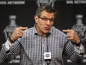 Canadiens general manager Marc Bergevin answers questions following practice at the team's training facility in Brossard on April 29, 2015.