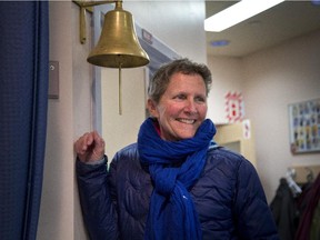 Judy Martin with the bell she had installed in the oncology department of Royal Victoria Hospital. The bell, which patients ring when they're done with their chemotherapy, will be making the move to the new superhospital.