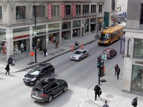 Peel St., looking north from Ste-Catherine St. before construction to replace sewer pipes removed the entire block from the city's traffic grid.