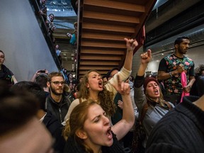 Students shout in support of the protesters arrested at UQAM for disrupting classes, a violation of a court injunction, in Montreal on Wednesday, April 8, 2015.