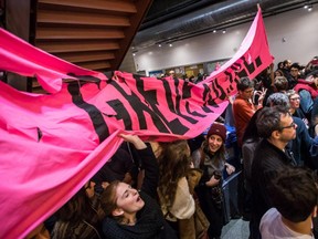 Students scream is support of the protesters that were arrested at UQAM for disrupting classes, a violation of a court injunction, in Montreal on Wednesday, April 8, 2015. The injunction was granted to the university last week forbidding protesters from stopping students who would like to attend classes.