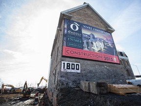 Construction work around an old church at the O'Nessy condo project on Rene-Levesque Blvd. in Montreal April 9, 2015.