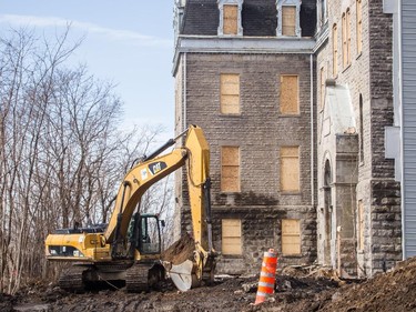 Construction work around an old church at the O'Nessy condo project on Rene-Levesque Blvd. in Montreal April 9, 2015.