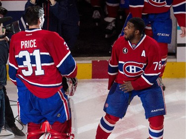 Montreal Canadiens defenceman P.K. Subban, right, teases Montreal Canadiens goalie Carey Price after price was pied in the face by Montreal Canadiens defenceman Alexei Emelin at the Bell Centre in Montreal on Thursday April 9, 2015. Price set a new team record with 43 regular season wins.