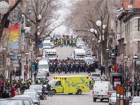 Student protesters are kettled by police on St-Denis street south of Sherbrooke in Montreal on Thursday, April 9, 2015. The protesters were demonstrating against what they see as the Quebec government's austerity policies as well as the arrests of protesters who were detained for disrupting classes at UQAM in violation of a court-ordered injunction.