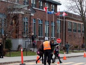 Parents and young students leave Lower Canada College (LCC) in 2012.