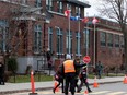 Parents and yoiung students leave Lower Canada College (LCC) in 2012.