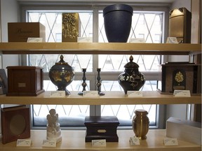 Urns on display in viewing room of a  fictional funeral home, which is part of the Collège Rosemont's thanatology techniques program. Those already in the industry are seeking a tougher law to oversee it.