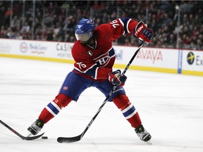 Montreal Canadiens P.K Subban passes the puck backwards through his legs during the first period of a National Hockey League game against the Florida Panthers in Montreal, Thursday February 19, 2015.