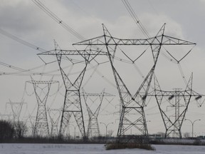 Hydro electricity power pylons at 736 Montée Sabourin in St-Bruno-de-Montarvilleon Monday, February 23, 2015.