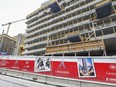 The Tour des Canadiens, right, and the Roccabella condominiums under construction around the Bell Centre in Montreal Tuesday January 27, 2015.