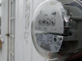 A hydro meter outside a home.