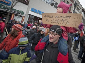 Families made up a large percentage of those marching up Park Avenue to the mountain for earth day in Montreal Quebec Sunday, April 22, 2012.