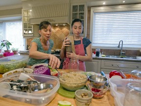 Helena, left, and daughter Shannon Leibgott, co-owners of Jarz, at work in their kitchen: "We are very disciplined,” Helena says