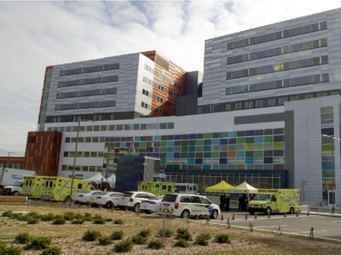 Ambulances wait at the MUHC Glen site during a move of patients and equipment from the Royal Victoria Hospital, in Montreal, Sunday April 26, 2015.