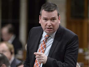 Minister of International Development Christian Paradis answers a question during Question Period in the House of Commons in Ottawa on Tuesday, March 31, 2015.