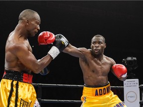 Adonis Stevenson punches Sakio Bika during the light heavyweight world championship main event bout on April 4, 2015, in Quebec City.