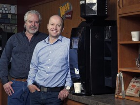 Mike Cochrane, left, business development manager, and François Baron, owner of Cafection, at the company's factory on Thursday, April 2, 2015.