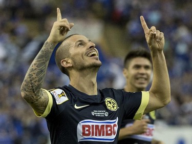Club America forward Dario Benedetto celebrates his third goal against the Montreal Impact during second half CONCACAF final action Wednesday, April 29, 2015 in Montreal. Mexico's Club America has beaten the Montreal Impact 4-2 to win the CONCACAF Champions League final.
