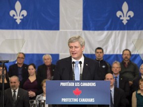Prime Minister Stephen Harper addresses families of victims of repeat violent offenders, Thursday, February 12, 2015 in Victoriaville, Que.