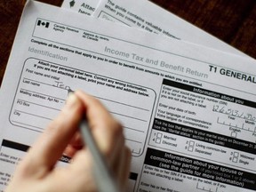 The T1 General 2010 form is pictured in Toronto on April 13, 2011. Fear of making mistakes and missing deductions can trip up Canadians who are doing their own income taxes, say tax experts.