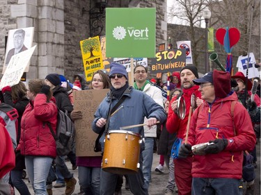 Thousands of people march for a better environment Saturday, April 11, 2015 in Quebec City. People protested as a meeting of Canadian premiers is scheduled on Tuesday in Quebec City.