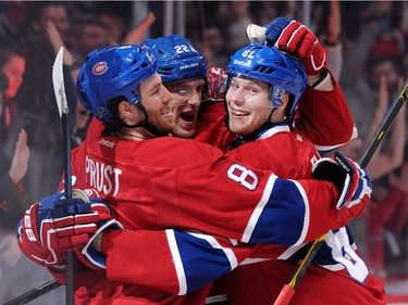 Lars Eller (81) of the Montreal Canadiens celebrates his second-period goal with teammates during the NHL game against the Washington Capitals at the Bell Centre on April 2, 2015 in Montreal, Quebec, Canada.