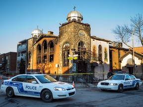 The blackened exterior of the Koimisis Tis Theotokou Greek Orthodox Church in Parc-Extension Tuesday after a fire that destroyed the church's interior.
