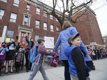 Young and old create a human chain at École Saint-Jean-de-Brébeuf on May Day 2015 to protest against the Quebec government's cuts in education.

Dario Ayala / Montreal Gazette