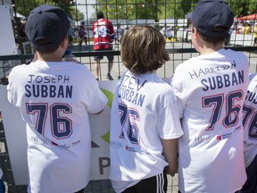 Young fans watch a charity street-hockey game with former Canadiens players as part of the 2014 Hockey de rue tournament. The fourth annual event runs again on Sunday, May 31.
