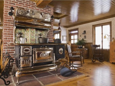 A 1907 Legare's Rural wood burning stove in the kitchen area was restored to its pristine condition by the original owner.