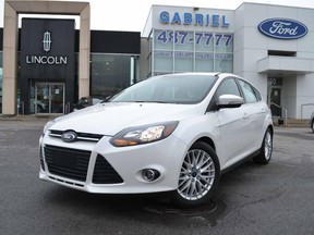 A brand-new 2014 Ford Focus Titanium Hatchback, featuring a moon roof, navigation, black leather, front-wheel drive and more. Retail price $30,364. Like It Buy It price $22,773, a savings of 25 per cent.