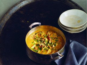 A homey chicken stew is part of African-American cuisine offered in the new cookbook Soul Food Love.