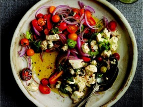 An olive-oil vinaigrette flavours this simple salad of tomatoes and onions.
