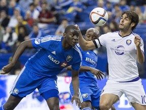 Montreal Impact's Bakary Soumare, left, battles Orlando City SC's Kaka or the ball during game on Saturday, March 28, 2015 in Montreal. Soumare is 55 minutes away from reaching 10,000 minutes played during his MLS career
