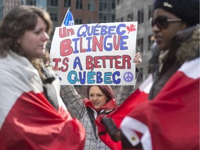 Protesters opposing language Bill 14 demonstrate outside the office of Quebec Premier Pauline Marois in 2013.
