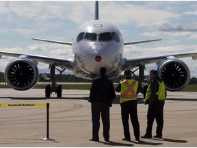 Bombardier's C-S100 taxis in after its maiden test flight at the company's facility in 2013.