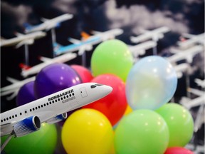 A model of a Bombardier CSeries jet among promotional balloons at the Farnborough Air Show in 2014.