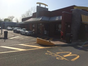 Customers make their way through the drive-thru at the McDonald's restaurant on St-Charles Blvd. in Beaconsfield on McHappy Day on May 6, 2015.